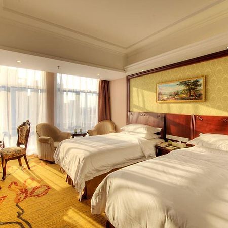 Vienna Hotel Shanghai Happy Valley Сунцзян Экстерьер фото